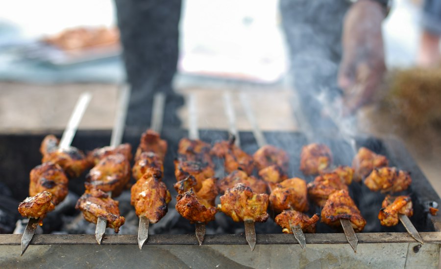Kebabs charring over the tandoor
